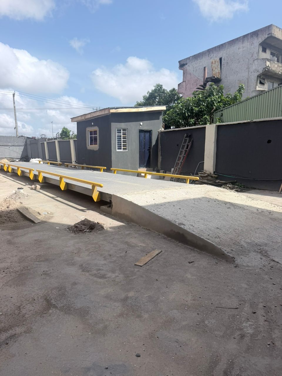 Completed Kira Scales weighbridge installation with guardrails