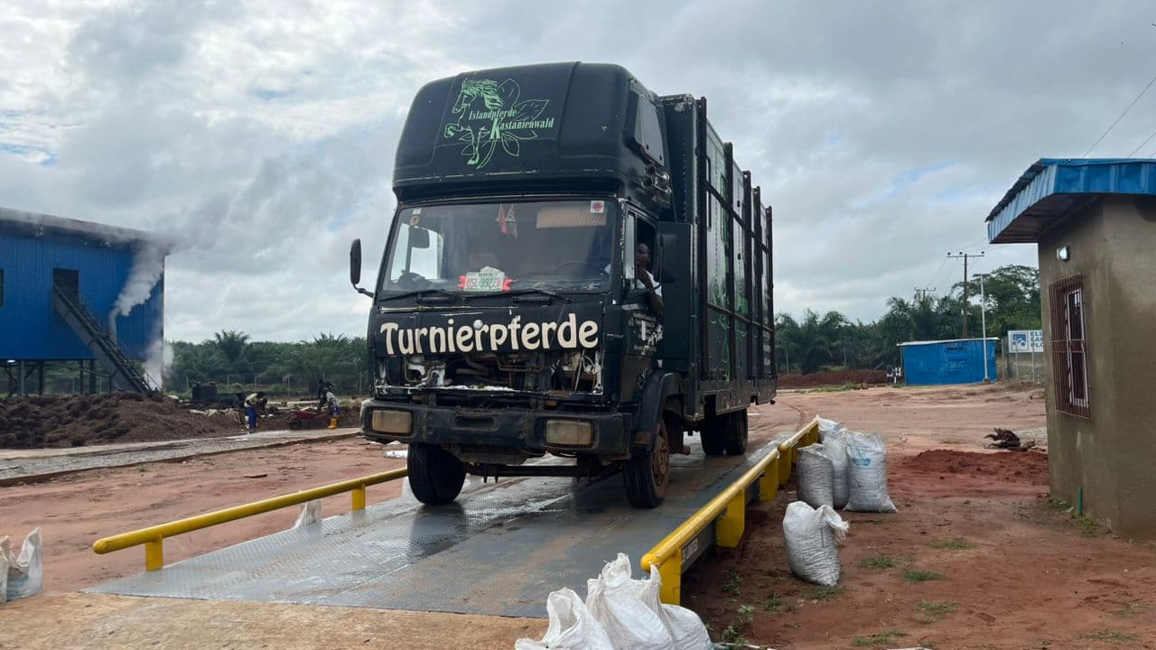 Truck weighing on a surface-mounted Kira Scales weighbridge at an agro-processing site