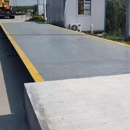 Weighbridge with concrete approach ramp